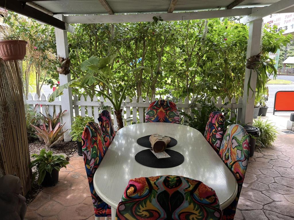 Selection of homemade cakes and slices on the cafe counter.
